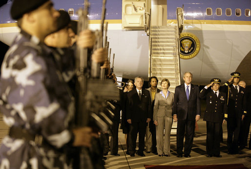 President George W. Bush and Mrs. Laura Bush arrive Friday, March 9, 2007, at Carrasco International Airport in Montevideo, Uruguay, where they are scheduled to spend two days before continuing their six-day Latin American visit. White House photo by Eric Draper