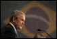 President George W. Bush smiles as he listens to Brazil President Luiz Inacio Lula da Silva reply to a question Friday, March 9, 2007, during a joint press availability in Sao Paulo. Said President Lula, "The memorandum of understanding on biofuels, which our ministers signed today, is a decisive step. Bringing together their efforts, the U.S. and Brazil can further push the democratization of energy and bring biofuels to all." White House photo by Paul Morse