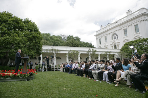 President George W. Bush addresses 200 exchange students from the program in the Rose Garden Monday, June 13, 2005. Living with host families for one year, the students come from mostly Muslim countries. "I think your generation is going to help shape one of the most exciting periods of history in the broader Middle East and the world," said the President. "It's a period of time when the hope of liberty is spreading to millions." White House photo by Eric Draper