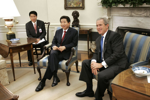 President George W. Bush and President Roh Moo-hyun of the Republic of Korea meet in the Oval Office Friday, June 10, 2005. White House photo by Paul Morse