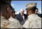 Vice President Dick Cheney shakes hands with U.S. Marine and Navy Personnel stationed at Marine Corps Air Station New River after speaking with the crowd in Jacksonville, NC, Monday October 3, 2005. White House photo by David Bohrer