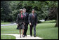 Harriet Miers escorts Supreme Court Associate Justice nominee John G. Roberts Jr. along the South Lawn sidewalk en route to the Oval Office to meet with President George W. Bush July 19, 2005. White House photo by Eric Draper