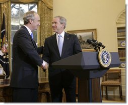 President George W. Bush and Idaho Gov. Dirk Kempthorne exchange handshakes in the Oval Office after the President announced Thursday, March 16, 2006, his intention to nominate the Governor to be Secretary of the Interior. White House photo by Paul Morse