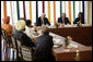 President George W. Bush and Secretary of State Condoleezza Rice are joined by Ambassador David Mulford during a meeting with religious leaders Thursday, March 2, 2006, at the Maurya Sheraton Hotel and Towers in New Delhi. White House photo by Eric Draper