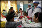 Mrs. Laura Bush meets with teachers and children, Thursday, March 2, 2006, during her visit to Mother Teresa's Jeevan Jyoti (Light of Life) Home for Disabled Children in New Delhi, India. White House photo by Shealah Craighead