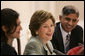 Mrs. Laura Bush addresses a roundtable discussion during an Education Through Partnerships meeting with representatives from USAID, UNESCO & CRI at library at the U.S. Embassy , Saturday, March 4, 2006 in Islamabad, Pakistan. White House photo by Shealah Craighead