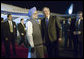 President George W. Bush is welcomed to India by Indian Prime Minister Manmohan Singh upon Air Force One's arrival Wednesday, March 1, 2006, at Indira Gandhi International Airport. The President and First Lady are scheduled to spend three days in the country before flying to Pakistan. White House photo by Eric Draper