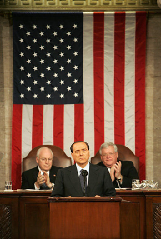 Vice President Dick Cheney and House Speaker J. Dennis Hastert applaud Italian Prime Minister Silvio Berlusconi during an address to a joint session of Congress, Wednesday, March 1, 2006. The Prime Minister’s speech to the joint session was part of a three-day visit to Washington that included a visit to the White House, where he met with President George W. Bush and discussed Italy’s continued allied relationship with the US in the global war on terror. White House photo by David Bohrer