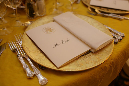 The dinner setting for Mrs. Laura Bush is seen Thursday evening, March 23, 2006 in the Blue Room of the White House, set a Social Dinner hosted by President George W. Bush and Mrs. Bush in honor of the 300th Birthday of Benjamin Franklin White House photo by Shealah Craighead