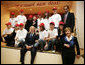 President George W. Bush and Mrs. Laura Bush pose with students from School 57 in Kyiv Tuesday, April 1, 2008, after the Ukrainian teens performed a skit sponsored by PEPFAR, the President's Emergency Plan for AIDS Relief. White House photo by Shealah Craighead