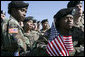 The eyes of Fort Hood, Texas are upon President George W. Bush as members of the 1st Cavalry Division and the 4th Infantry Division listen as he thanks them for their service and sacrifice in Iraq. "You're making America proud. You're making America free. And you're making the world more peaceful," the President said. "I want to thank you for all you've done for our great nation." White House photo by Eric Draper