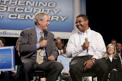 President George W. Bush talks with Yuctan Hodge, 24, during a conversation on Social Security at the James Lee Community Center, Falls Church, Va., Friday, April 29, 2005. White House photo by Paul Morse