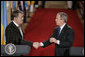 President Bush and President Yushchenko shake hands after a press availability Monday, April 4, 2005. The Ukraine president and his wife visited the White House for the day.White House photo by Paul Morse