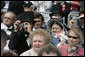 One of the many Lincoln look-alikes attending the dedication of the Abraham Lincoln Presidential Library and Museum captures a few memories for himself in Springfield, Ill., Tuesday, April 19, 2005. White House photo by Eric Draper