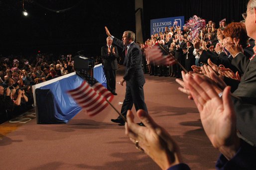 President George W. Bush acknowledges the crowd during his introduction at the Illinois Welcome at the Illinois Police Armory in Springfield, Illinois, Sunday, Nov. 3, 2002 White House photo by Eric Draper.