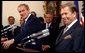 President George W. Bush listens to an interpreter during a joint press conference with Czech Republic President Vaclav Havel at Prague Castle in Prague, Czech Republic, Wednesday Nov. 20. White House photo by Paul Morse