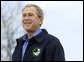 President George W. Bush smiles during his introduction before delivering remarks on Earth Day at Wells National Estuarine Research Reserve in Wells, Maine, Thursday, April 22, 2004. "The importance about Earth Day is that it reminds us that we can't take the natural wonders for granted. That's what Earth Day says to me, and I hope it says to you, as well, that we have responsibilities to the natural world to conserve that which we have and to make it even better," said the President in his remarks. White House photo by Eric Draper.