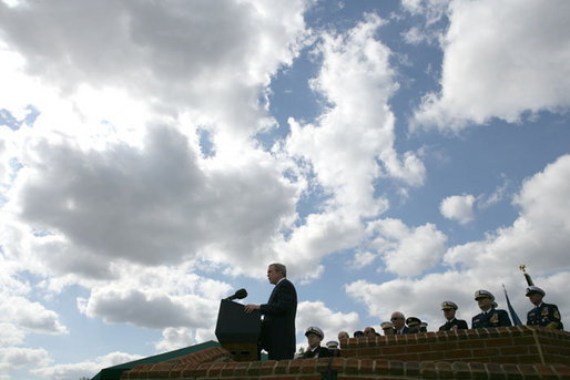 President George W. Bush delivers remarks during an Armed Forces farewell tribute in honor of Marine General Peter Pace and Armed Forces hail in honor of Navy Admiral Michael Mullen, Monday, October 1, 2007 at Fort Myer, Virginia. Speaking in honor of General Pace, President Bush said, "General Pace, throughout your life, you have led those troops to honorable achievements and into the pages of history. Because of your example, you can know that with courage, valor and confidence, they will take it from here". White House photo by Eric Draper