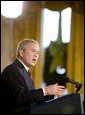 President George W. Bush addresses the media during a press conference Monday, Dec. 19, 2005, in the East Room of the White House. Before responding to reporters' questioning, the President, speaking on Iraq, told the gathering, ". This election does not mean the end of violence, but it is the beginning of something new: A constitutional democracy at the heart of the Middle East." White House photo by Paul Morse