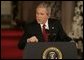 President George W. Bush emphasizes a point as he responds to a reporter's question Monday, Dec. 19, 2005, during a news conference in the East Room of the White House. White House photo by Kimberlee Hewitt