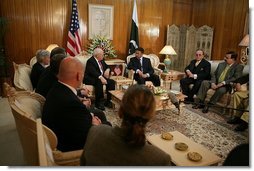 Vice President Dick Cheney discusses earthquake relief efforts with Pakistani President Pervez Musharraf, Tuesday Dec. 20, 2005. President Musharraf thanked the Vice President for the US relief assistance and said, "I don't think we could have managed the relief operation without your support."  White House photo by David Bohrer