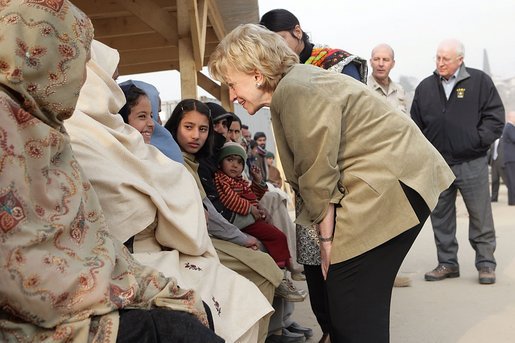 Vice President Dick Cheney and Mrs. Lynne Cheney greet Pakistani patients awaiting care at the 212th M.A.S.H. Unit near the earthquake's epicenter Tuesday, Dec. 20, 2005. White House photo by David Bohrer