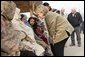 Vice President Dick Cheney and Mrs. Lynne Cheney greet Pakistani patients awaiting care at the 212th M.A.S.H. Unit near the earthquake's epicenter Tuesday, Dec. 20, 2005. White House photo by David Bohrer