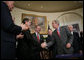 President George W. Bush shakes hands with Senator Bill Frist (R-Tenn.), House Majority Leader, after signing into law H.R. 2520, the Stem Cell Therapeutic and Research Act of 2005, during ceremonies in the Roosevelt Room. White House photo by Paul Morse