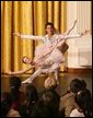 Children gather in the East Room of the White House, Monday, Dec. 5, 2005, as they watch a dance performance during the White House Children's Holiday Reception in the East Room. White House photo by Shealah Craighead