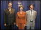 Laura Bush visits with Talib Aziz M. Zaini, Minister of Youth and Sports for Iraq, left, and Abbas Kadim Ibrahim, Director General, Ministry of Youth and Sports for Iraq, at the National Youth Summit in Washington, D.C., Friday, July 29, 2005. The Iraqi officials attended the summit to increase their understanding of youth development. White House photo by Krisanne Johnson