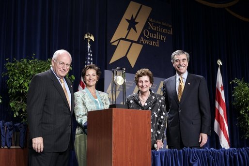 Vice President Dick Cheney and Commerce Secretary Carlos Gutierrez, far right, stand with representatives of The Bama Companies, Inc., which is one of four companies awarded the Malcolm Baldrige National Quality Award during a ceremony in Washington, D.C., Tuesday, July 20, 2005. White House photo by Paul Morse