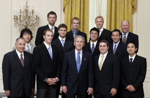 President George W. Bush stands with members of the UCLA Men's Tennis team during Championship Day Tuesday, July 12, 2005, at the White House. White House photo by David Bohrer