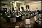 G8 leaders gather around the table for a morning session at the Gleneagles Hotel in Auchterarder, Scotland. The summit ended Friday, July 8, 2005. White House photo by Eric Draper