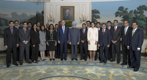 President George W. Bush and Prime Minister Dr. Manmohan Singh of India pose with Indian-American appointees working in the Bush administration in the Diplomatic Reception Room at the White House Monday, July 18, 2005. White House photo by Eric Draper