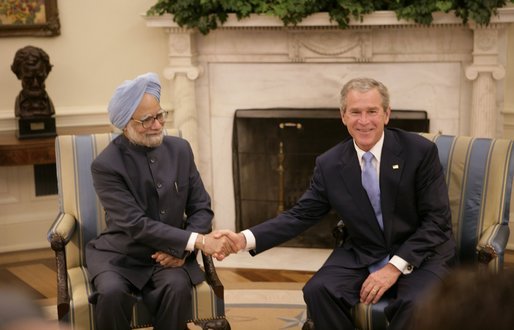 President Bush shakes hands with India's Prime Minister Dr. Manmohan Singh, Monday, July 18, 2005, during their meeting in the Oval Office. White House photo by Eric Draper