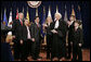 Justice Sandra Day O'Connor introduces Alberto Gonzalez to the audience after administering the oath of office to him during ceremonies welcoming him to his new post of U.S. Attorney General. Justice O’Connor submitted her resignation to President George W. Bush Friday, July 1, 2005, to spend more time with her husband, John O’Connor. File photo. White House photo by Paul Morse