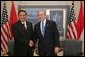 President George W. Bush greets Indonesian President Susilo Yudhoyono while attending an APEC summit in Santiago, Chile, Nov. 20, 2004.White House photo by Eric Draper