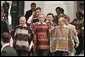 President George W. Bush walks with Chilean President Ricardo Lagos and Russian President Vladimir Putin to an APEC leaders group photo at La Moneda Presidential Palace in Santiago, Chile, Nov. 21, 2004. White House photo by Paul Morse