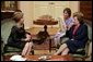 Laura Bush talks with Mrs. Luisa Duran de Lagos, wife of Chilean President Ricardo Lagos, at La Moneda Presidential Palace in Santiago, Chile, Nov. 21, 2004. White House photo by Susan Sterner