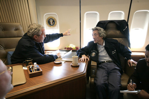 President George W. Bush and Japan's Prime Minister Junichiro Koizumi talk together on Air Force One Friday, June 30, 2006, as they fly to visit Graceland in Memphis. White House photo by Eric Draper