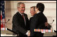 President George W. Bush shakes the hands of Chancellor Wolfgang Schuessel of Austria, center, and European Union President Jose Manuel Barroso following a press availability Wednesday, June 21, 2006, at the Hofburg Palace in Vienna. White House photo by Paul Morse