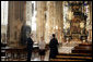 Mrs. Laura Bush admires the architecture of St. Stephen's Cathedral in Vienna, Austria, Wednesday, June 21, 2006, during a tour guided by Bernd Kolodziejczak, left, and Father Timothy McDonnell, right. The cathedral is of one of Vienna's most famous sights built in 1147 AD. White House photo by Shealah Craighead