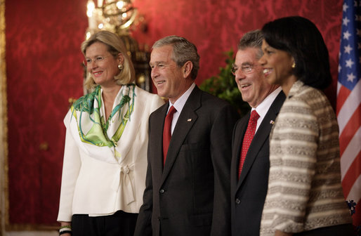 President George W. Bush is joined by Ursula Plassnik, Austria's Federal Minister of Foreign Affairs, and Secretary of State Condoleezza Rice Wednesday, June 21, 2006, as they stand with President Heinz Fischer of Austria for a photo opportunity prior to their meeting at Hofburg Palace in Vienna. White House photo by Eric Draper