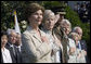 Mrs. Laura Bush stands with Lynne Pace and her husband, Chairman of the Joint Chiefs of Staff General Peter Pace, during the official arrival ceremony for Prime Minister Junichiro Koizumi of Japan on the South Lawn Thursday, June 29, 2006. White House photo by Eric Draper