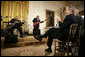 Legendary Blues guitarist B.B. King is applauded by President George W. Bush during King's performance in the East Room of the White House Monday, June 26, 2006, as part of the Black Music Month celebration focusing on the music of the Gulf Coast: Blues, Jazz and Soul. White House photo by Eric Draper