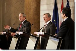 President George W. Bush delivers a statement during a press availability Wednesday, June 21, 2006, with Chancellor Wolfgang Schuessel of Austria, center, and European Union President Jose Manuel Barroso at the Hofburg Palace in Vienna during U.S.-EU Summit. Said the President, "We talked about democracy and new democracies, and I want to thank the European Union for its strong support of Afghanistan and Iraq." White House photo by Paul Morse