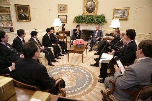 President George W. Bush meets with Thailand's Prime Minister Thaksin Shinawatra, during a visit to the Oval Office at the White House, Monday, Sept. 19, 2005 in Washington. White House photo by Eric Draper