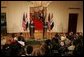 President George W. Bush and Iraq's President Jalal Talabani face the press during a joint availability Tuesday, Sept. 13, 2005, in the East Room of the White House. White House photo by Shealah Craighead