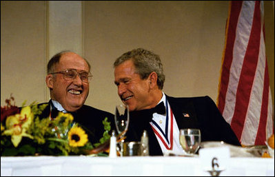 President George W. Bush jokes with Chief Justice William Rehnquist at the Alfalfa Club Dinner in Washington, D.C., Jan. 24, 2004. White House photo by Paul Morse