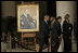 President George W. Bush and Laura Bush walk with Justice Antonin Scalia and Sally Rider, the Chief Justice's assistant, after viewing a portrait of Chief Justice William Rehnquist as his body lies in repose in the Great Hall of the U.S. Supreme Court Tuesday, Sept. 6, 2005. White House photo by Eric Draper